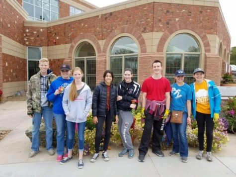 Interact Members Clean-up Around Conservatory