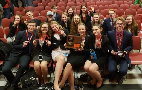 Members of Centrals Speech and Debate team pose with their hardware after winning 2nd place at their recent State Competition in Riverton.