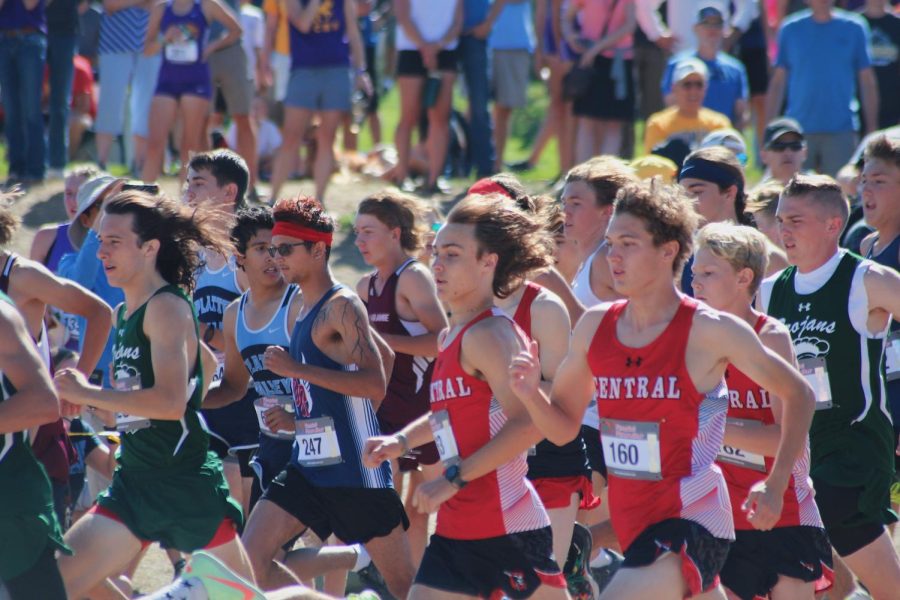 Members of Central's men's cross country team including Will Barrington, Sr., and Bridger Brokaw, Jr. set the pace at the Little America cross country meet.